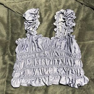 Medium blue top with ruffle straps